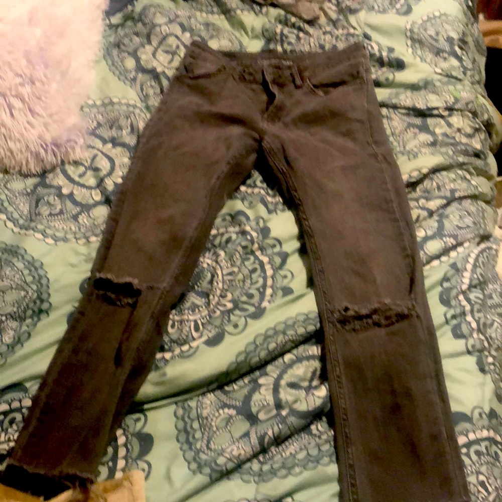 Grey ripped Calvin Klein jeans